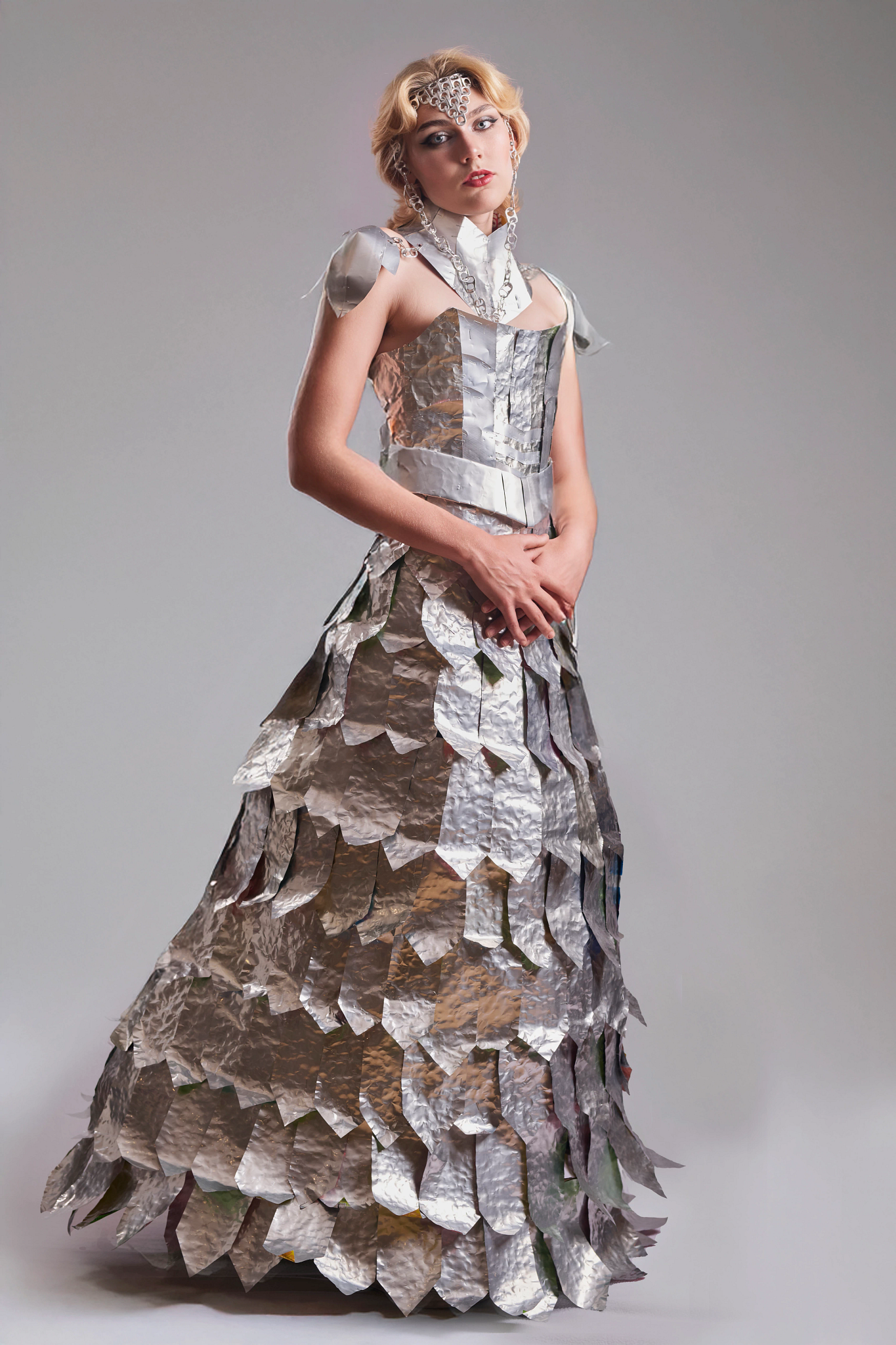 Recycle the Runway: Iron Maiden A high school student features a gown and accessories made from aluminum cans.