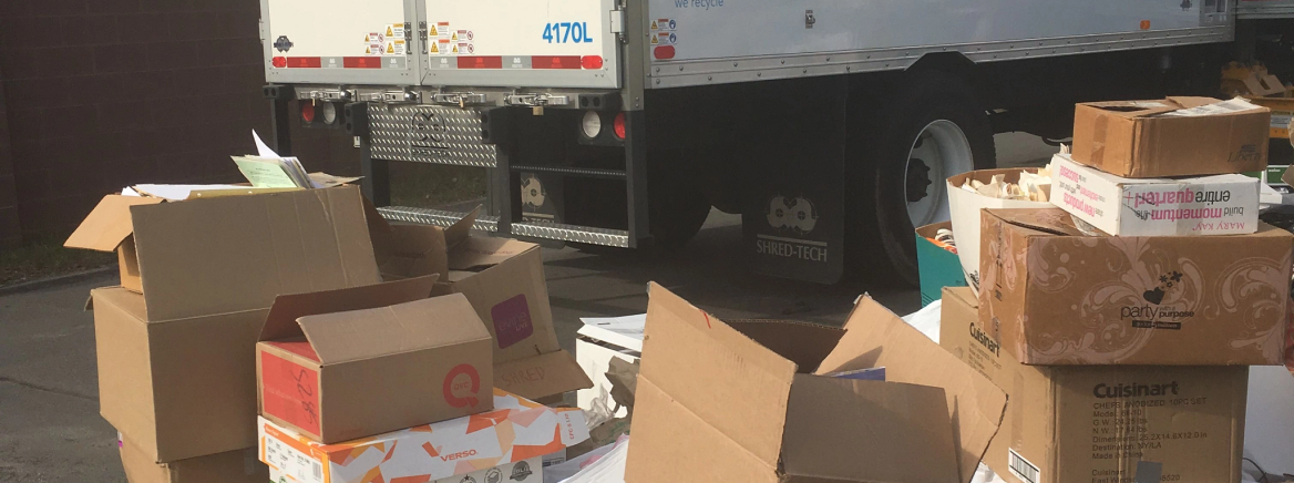 Boxes of paper at a paper shredding event