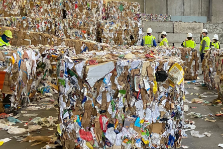Many boxes of recycling products in a large room